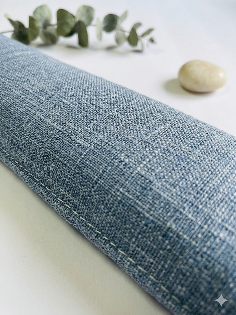 Close-up of the textured denim blue fabric