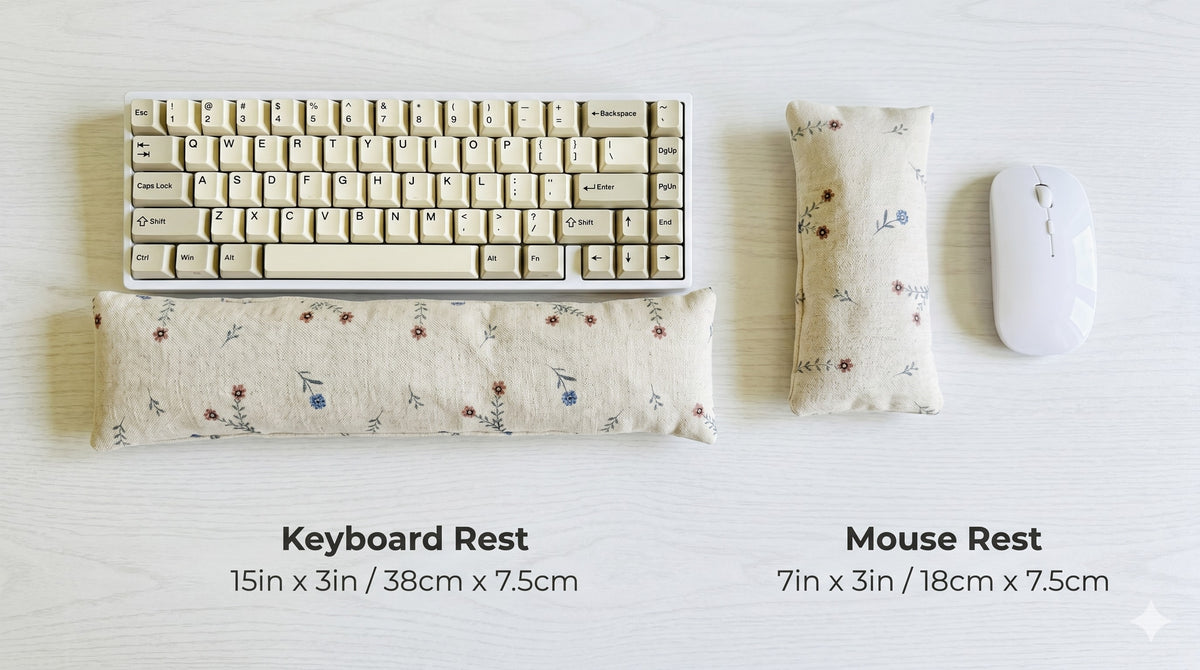 Ditsy floral linen keyboard rest, 15 × 3 in, and mouse rest, 7 × 3 in, beside a keyboard