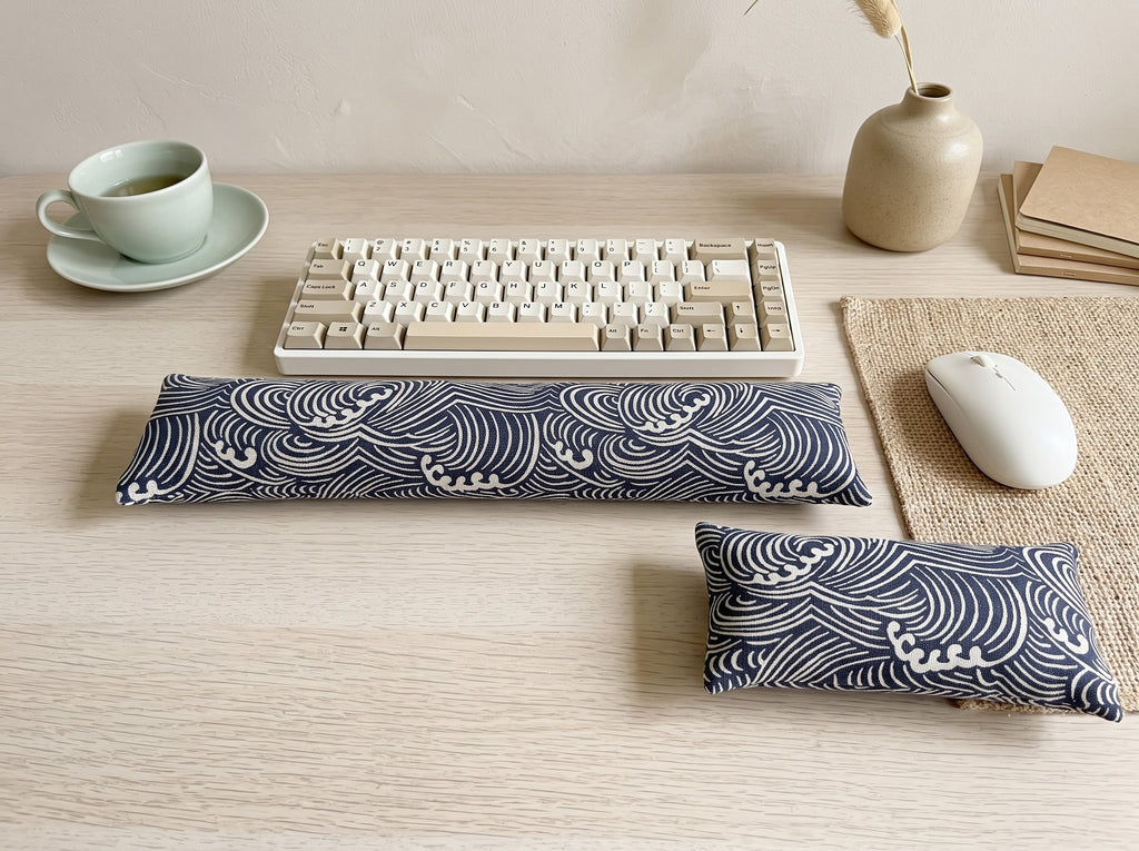 Japanese wave keyboard and mouse wrist rests in indigo and cream in front of a keyboard