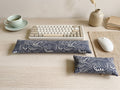Japanese wave keyboard and mouse wrist rests in indigo and cream in front of a keyboard