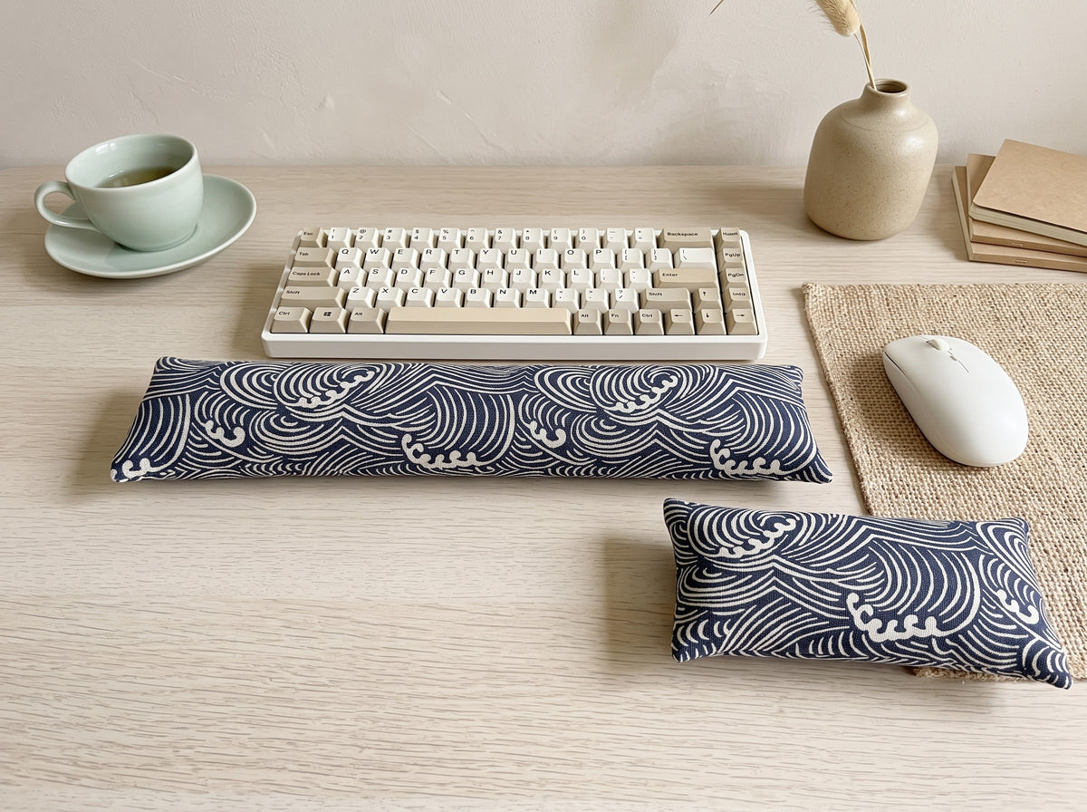 Japanese wave keyboard and mouse wrist rests in indigo and cream in front of a keyboard