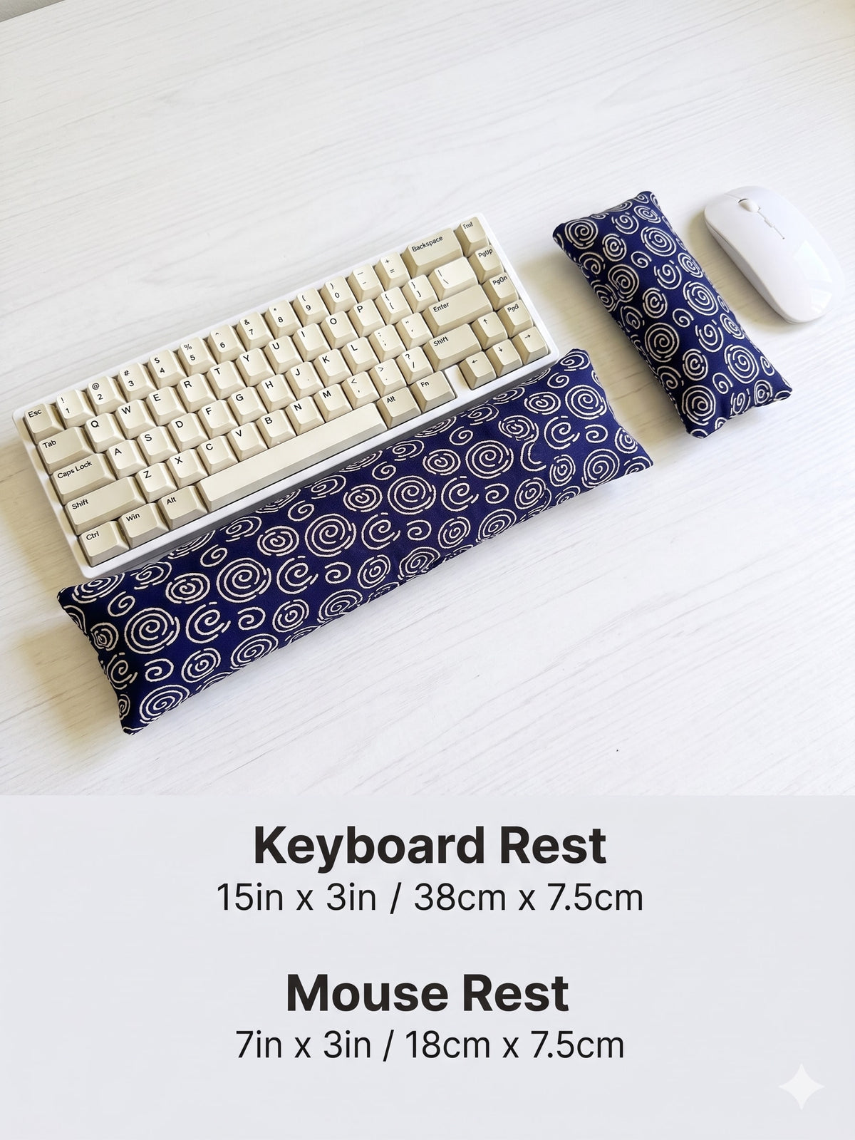 Blue spiral keyboard rest, 15 × 3 in, and mouse rest beside a keyboard and mouse