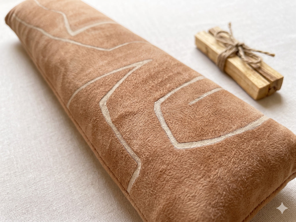 Close-up of the soft camel velvet and its white mudcloth-style lines