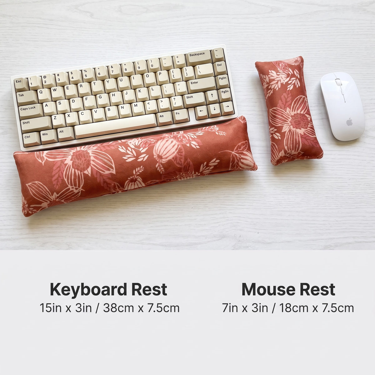 Terracotta bloom velvet keyboard rest, 15 × 3 in, and mouse rest, 7 × 3 in, beside a keyboard and mouse